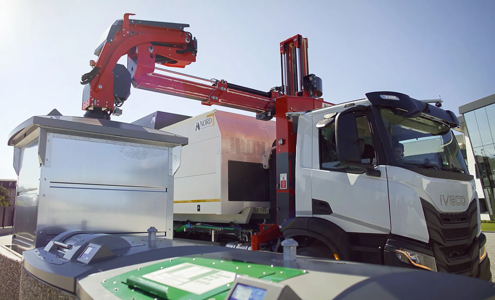 Collection truck lifting a Semi Underground container