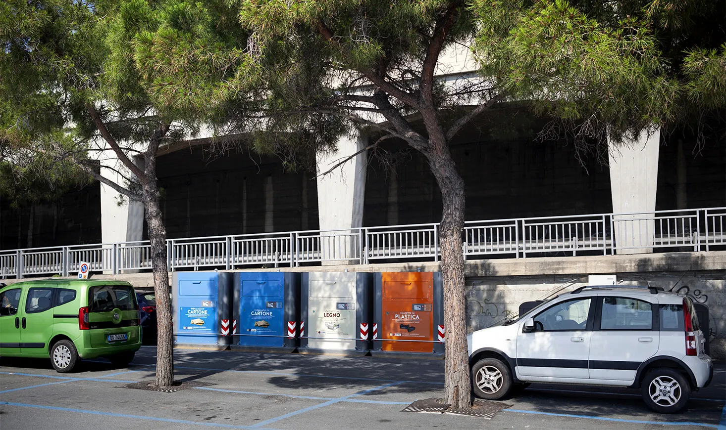 Row of Cube containers in a parking area