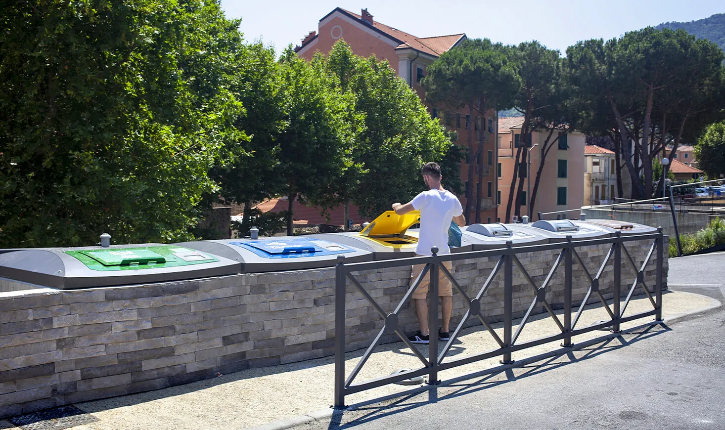 Semi Underground containers with stone cladding in Italy