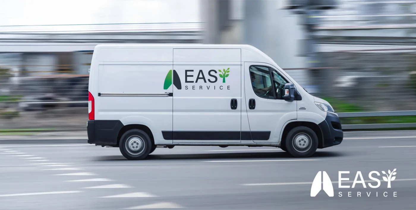 Easy Service van driving through the city