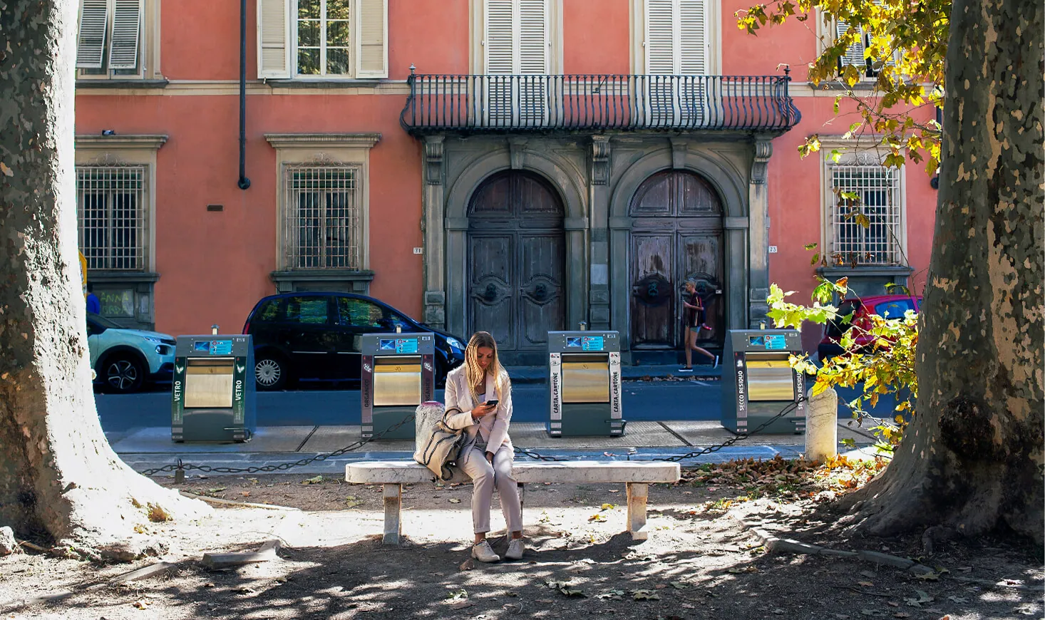 Underground containers in a pedestrian square