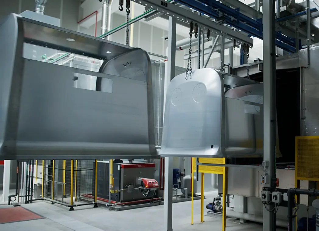 Steel container moving along the production line